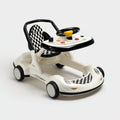 Girello per bambini - plastica-tessuto - 73x48x52 cm - bianco-nero-giallo - sportivo con volante e ruote